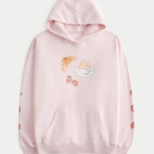 Hollister Light Pink Hoodie with Croissant and Coffee Design